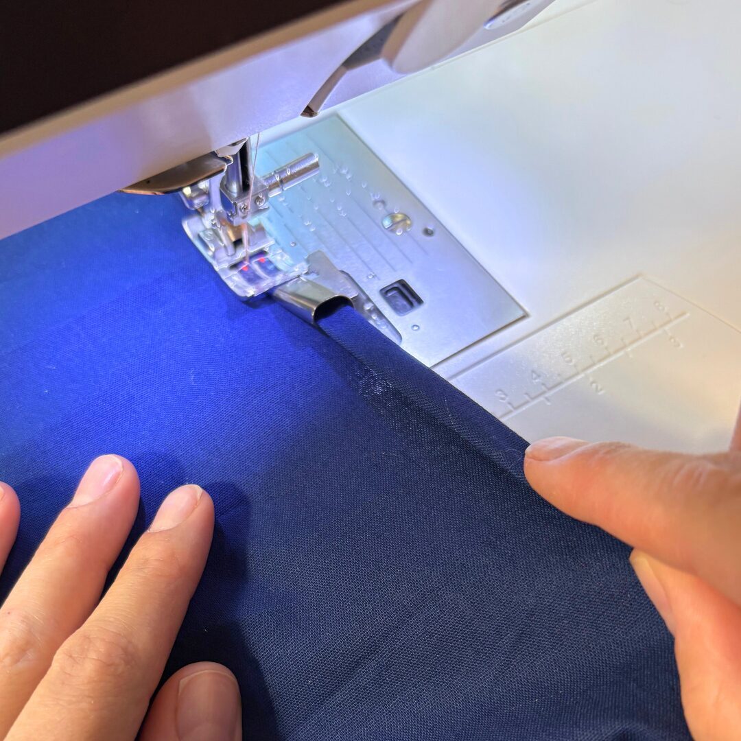 5 sew, feeding fabric